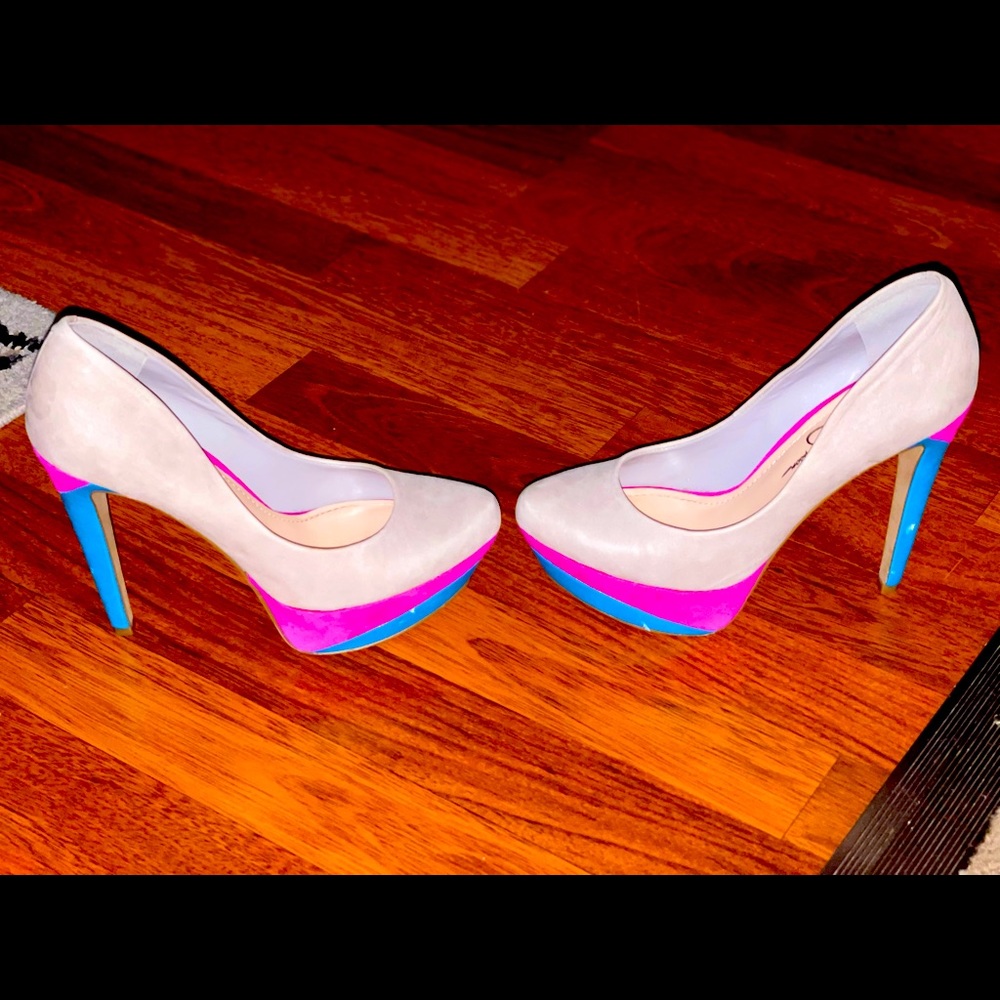 Jessica Simpson nude, pink and blue platform heels.